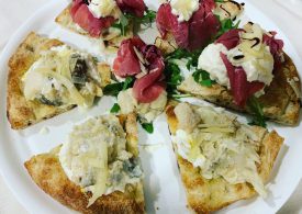 Pizza gourmet o polenta e "Musso"
