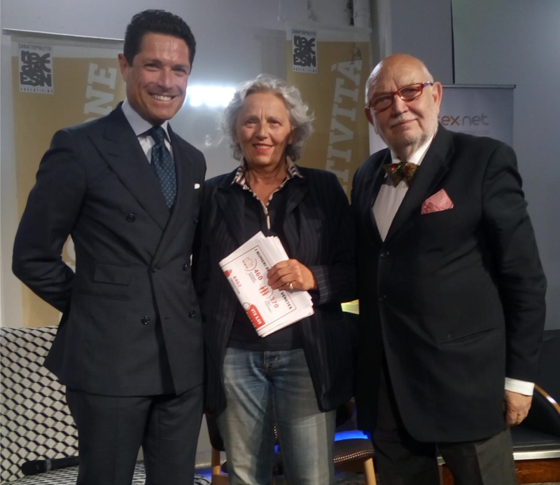 la foto con il trio è composta da Belekda, Matteo Marzotto all'epoca
presidente Ente Turismo Nazionale Italiano  e presidente dell'Ente Fiera
di Vicenza, e Gianna Sartori orafa e autrice e curatrice di Mostre sui
gioielli